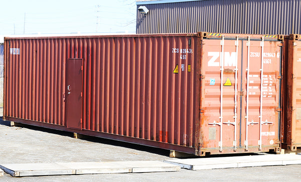 shipping container modified with additional man door