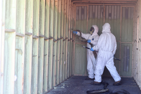 Spray foaming a shipping container
