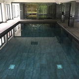 Stunning black tiled pool