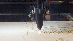 MAD Museum laser cutting