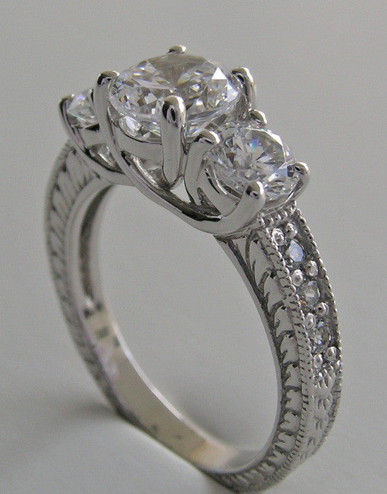 GRACEFUL THREE STONE DIAMOND ENGAGEMENT RING SETTING
