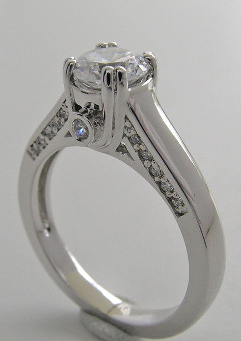 INTERESTING ENGAGEMENT RING SETTING WITH DIAMOND PEEK A BOO ACCENTS