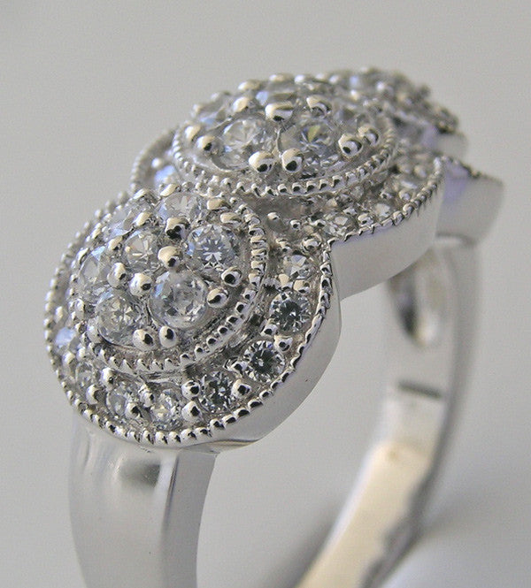SPECTACULAR DIAMOND PAVE THREE STONE DIAMOND RING