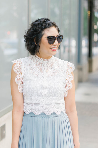 styling your palazzo pants with a lace top.