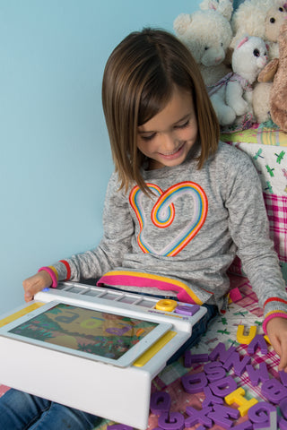 Young girl playing Square Panda