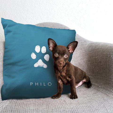 puppy sitting next to personalized pet gift paw print pillow