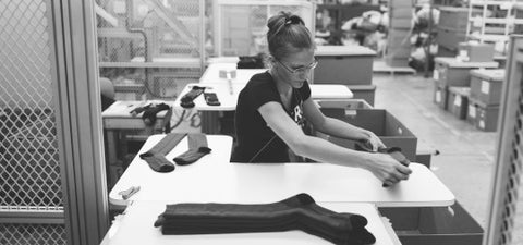 Removing Farm To Feet socks from Boarding Machine - Photo by Jordan Brannock