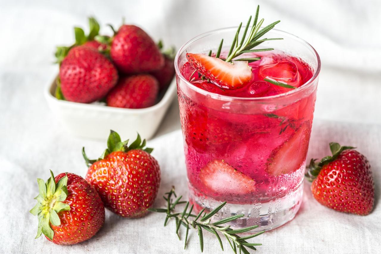 A glass of water infused with strawberries