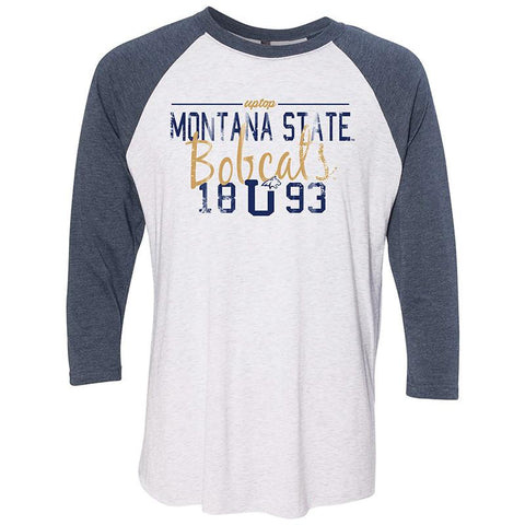A white shirt with mid length blue sleeves taht says Montana State Bobcats 1893