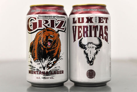 A can of griz lager from Big Sky brewery with a grizzly on the front, a skull on the back and saying Lux Et Veritas.
