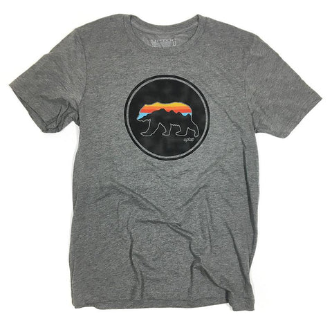 Grey tee shirt with the outline of a grizzly filled with rainbow colors that says UPTOP.