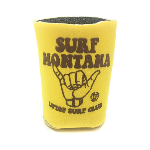 A yellow koozie that says Surf Montana in brown lettering