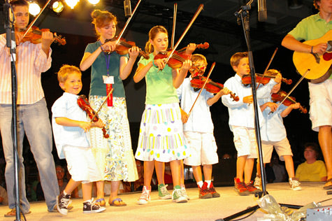 A family performing during the Oldtime Fiddle Festival and Contest.