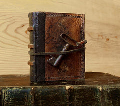 vintage leather miniature journal with antique key