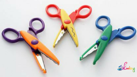 three pairs of multi-colored children's scissors