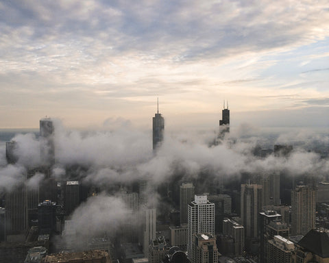 image of clouds drifting across the Chicago skyline @KBUCKLANDPHOTO