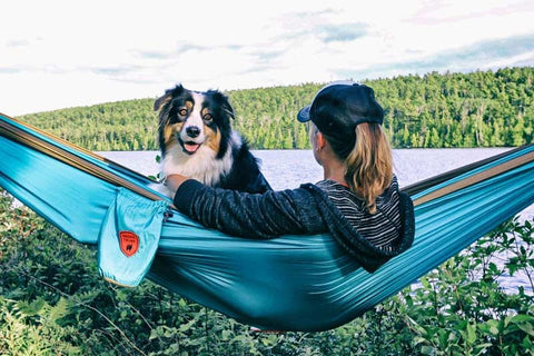 Maria Schultz hammocking with her dog