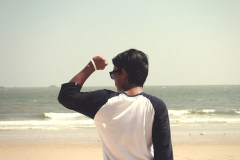 bearded man on a beach