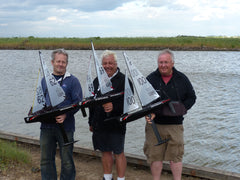  (Photo credit: John Tushingham) July 2013. The so-called ‘gang of three’. (L to R) Mark Dicks, Mike Weston & John Tushingham. Mike was trying out the shorter keel, not sure if the 30-40mph winds that day were entirely suitable, but was a fun days sailing.