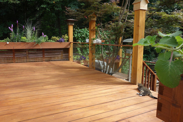 Self-Watering elevated deck, patio, and backyard garden. Cedar raised beds, container gardens, and veggie/vegetable gardens featuring GardenWell sub-irrigation to create wicking beds for growing your own food.