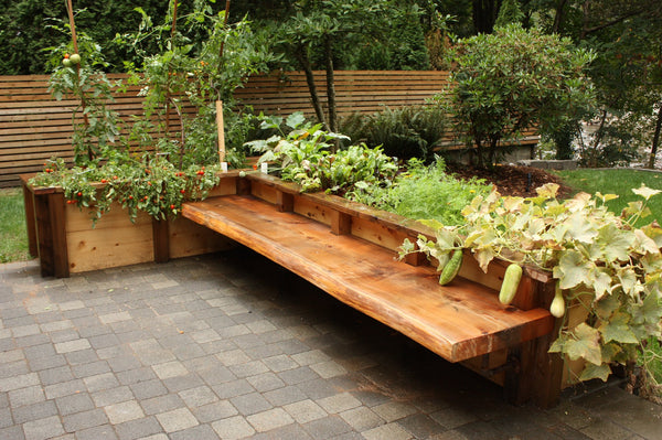 Self-Watering elevated patio garden. Cedar raised beds, container gardens, and veggie/vegetable gardens featuring GardenWell sub-irrigation to create wicking beds for growing your own food.