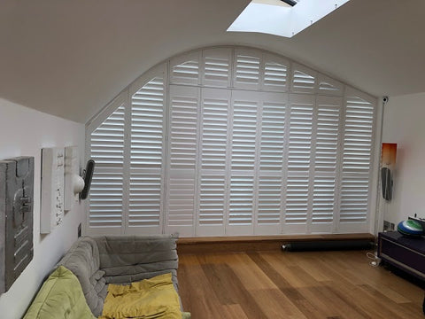 white shutters in bespoke shape in a houseboat refurbishment project