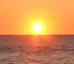 Sun risings over the ocean