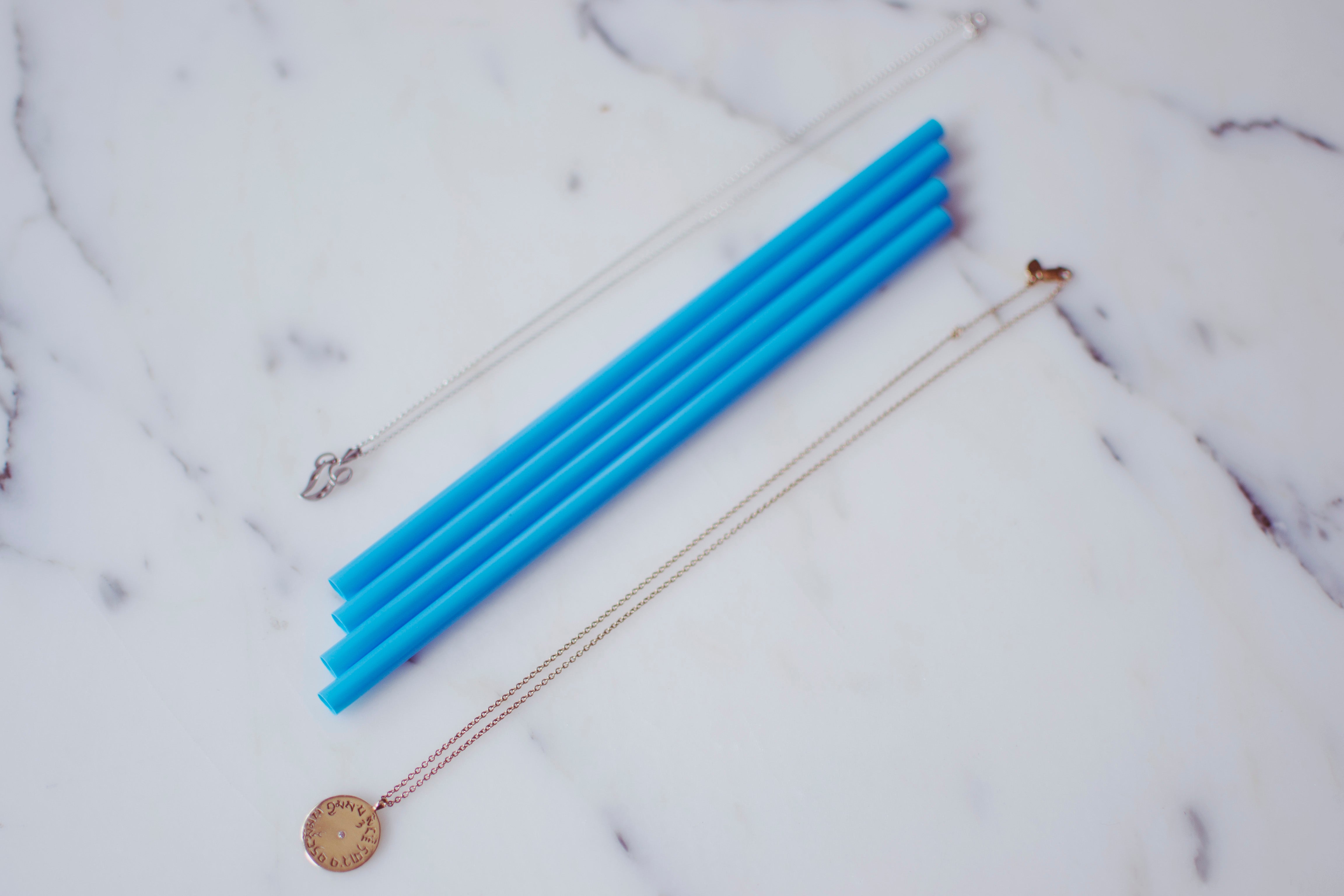 how to pack jewelry when you travel, drinking straws