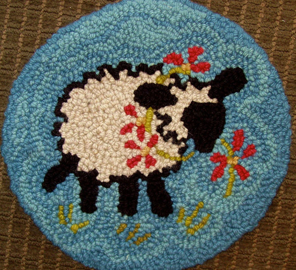 Circular lamb rug by Cindy Nordin