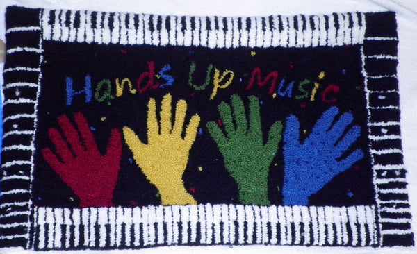 Hands Up Music Pillow. Designed and punched by Nancy Reams, Chippewa Falls, Wisconsin. 