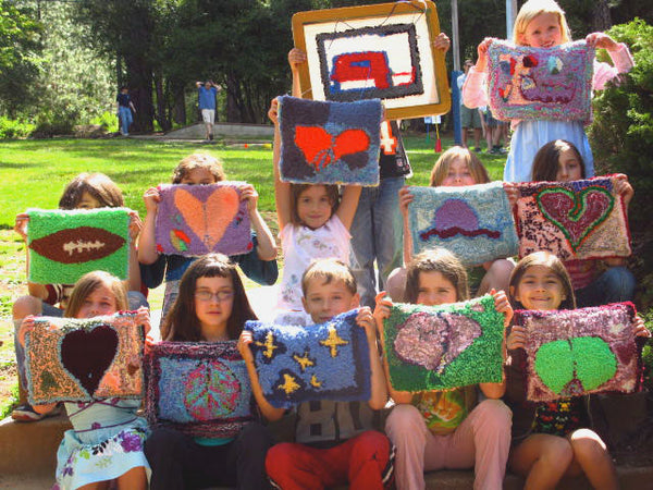 Nevada City School Children with their Rugs. 