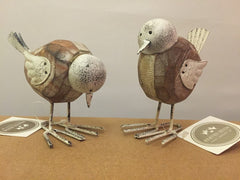 Wooden birds with wire feet