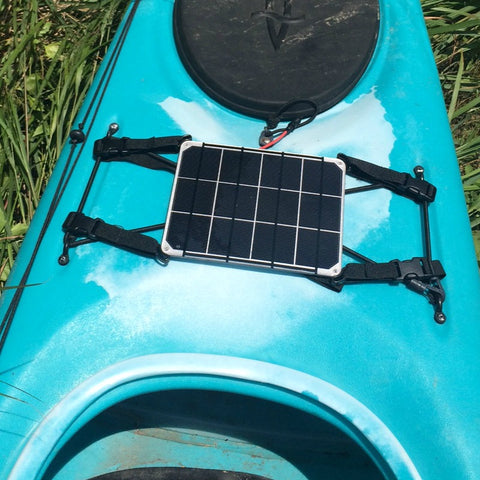waterproof 6W solar panel with aluminium backing with urethane coating - featuring plastic edge mounts to allow easy webbing to connect to kayak.