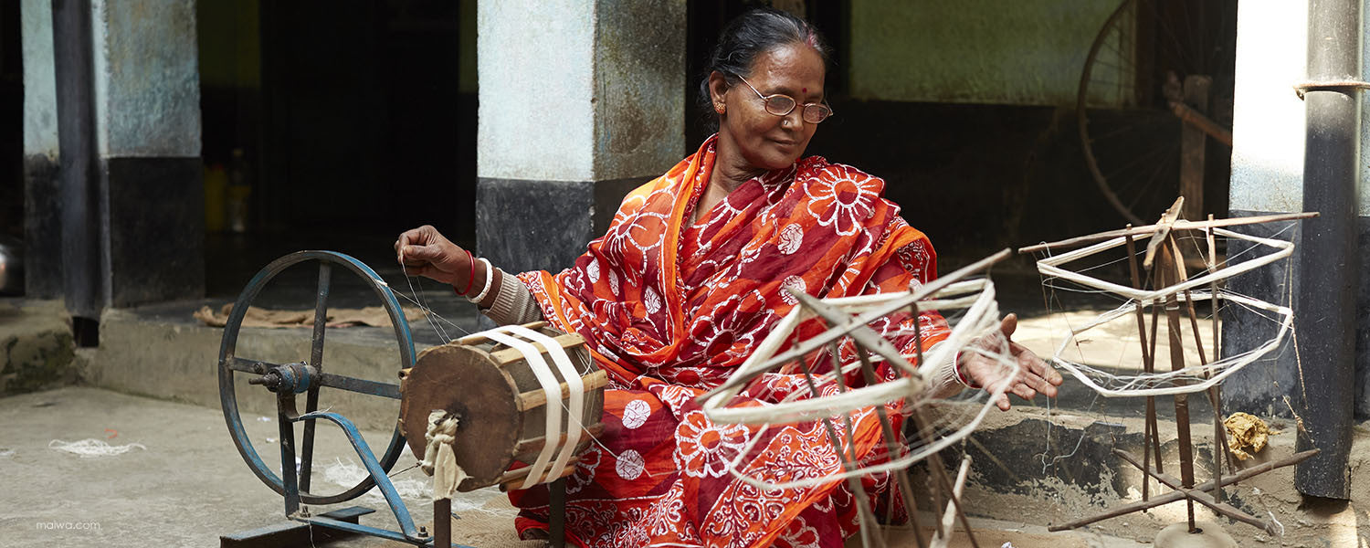 Preparing yarns for hand weaving.