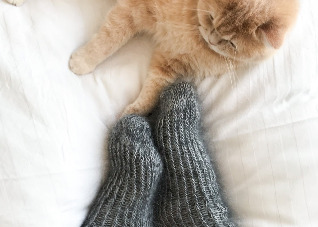 Fluffy grey socks with cream kitten