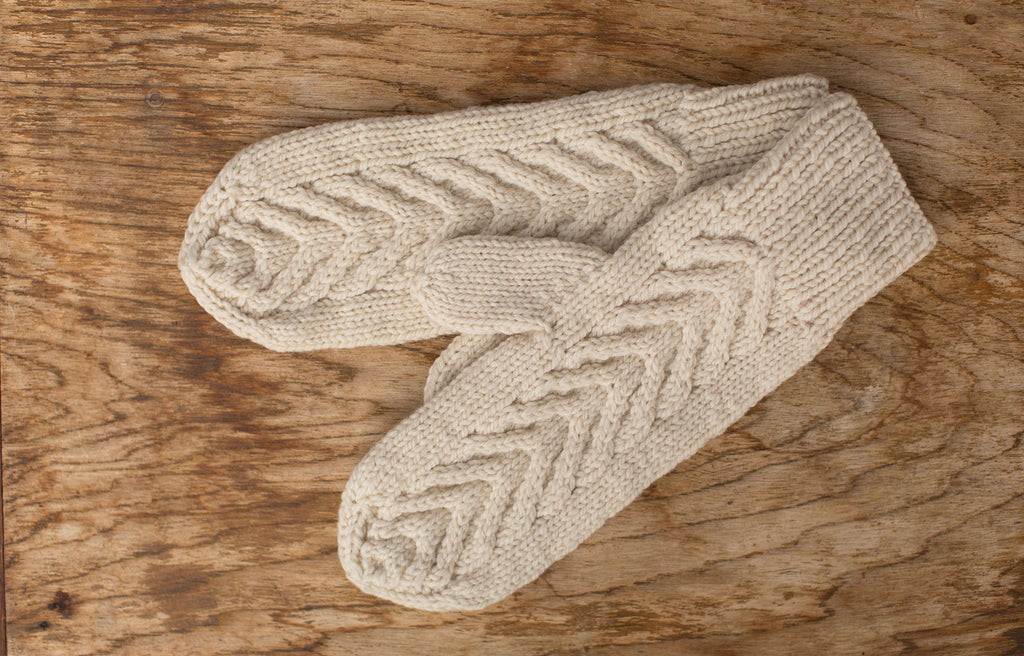 White mittens. Handmade by the TOM BIHN Ravelry group for the TOM BIHN crew.