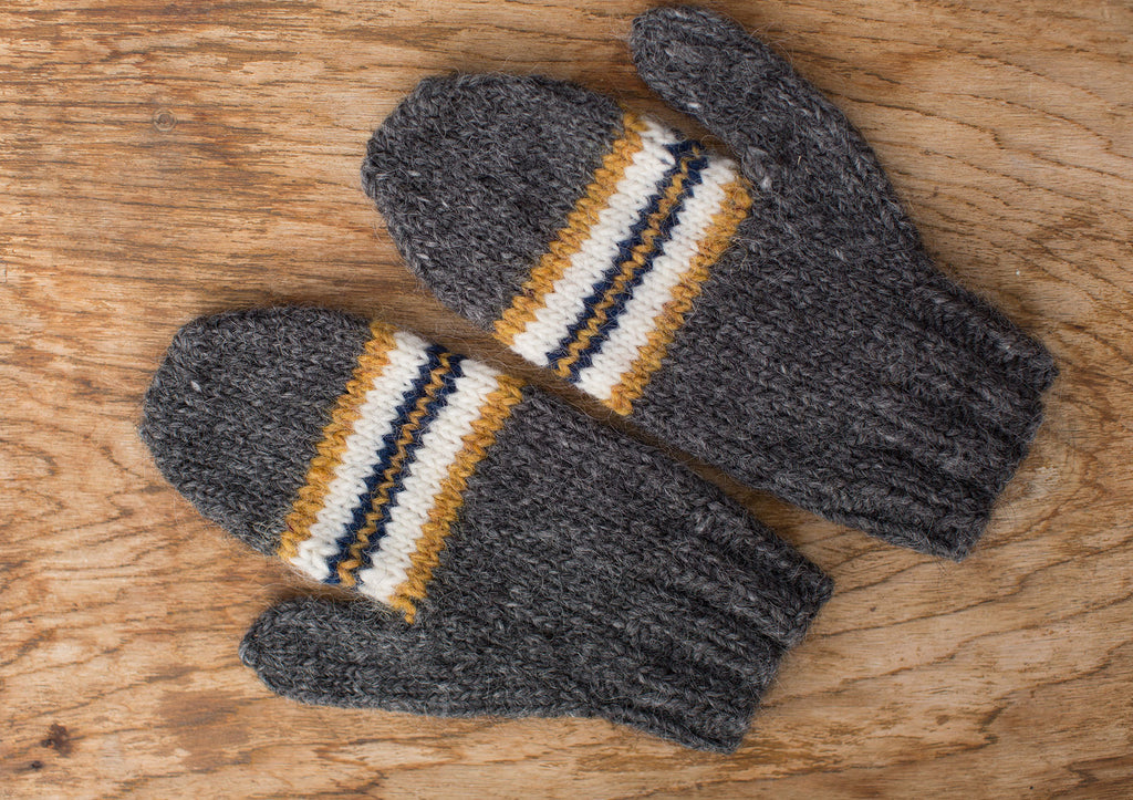 Dark grey mittens with white, yellow, and navy stripes. 