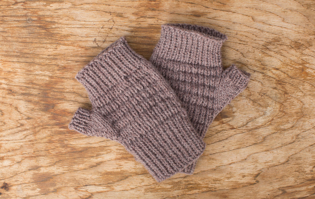 Natural tan/brown fingerless mittens. Handmade by the TOM BIHN Ravelry group for the TOM BIHN crew.