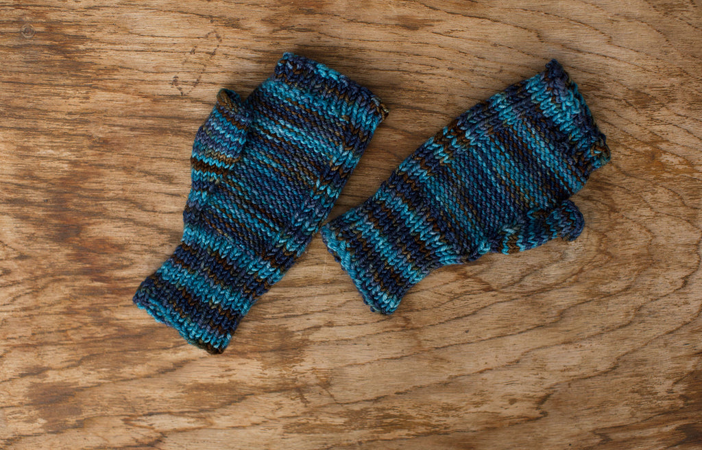 Brown and blue fingerless gloves. Handmade by the TOM BIHN Ravelry group for the TOM BIHN crew.