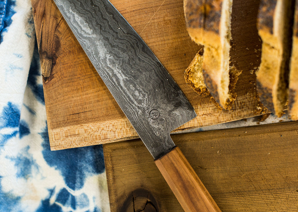 Tom made homemade bread for the party; this knife was shared with us in trade by the esteemed bladesmith Daniel Gentile.