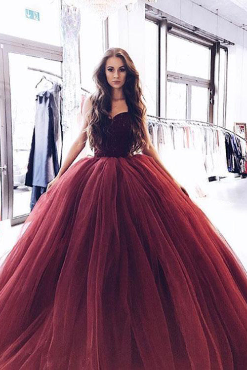 red strapless ball gown prom dress