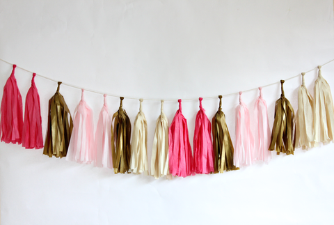 pink and gold tassel banner