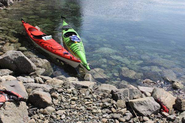 Kayaks coupled using one sea anchor