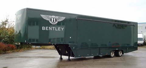 Bentley branded green enclosed auto trailer
