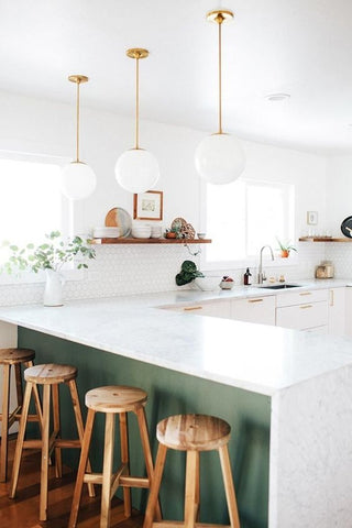 White kitchen with wooden barstools