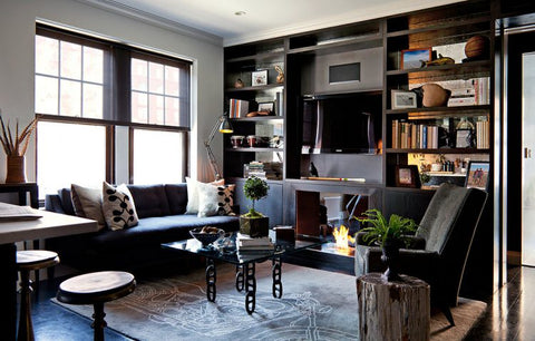 Masculine sitting room with a library