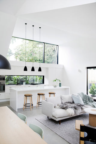 Interior of house with a white kitchen