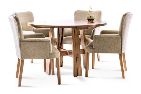 Otway round, solid timber dining table with Dane carver chairs upholstered in a neutral tone