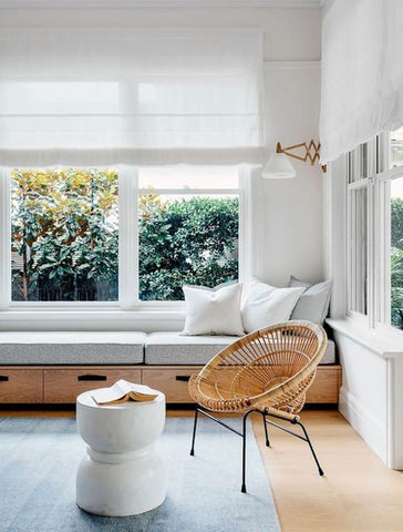 Corner space in home decorated with contemporary furnishings.