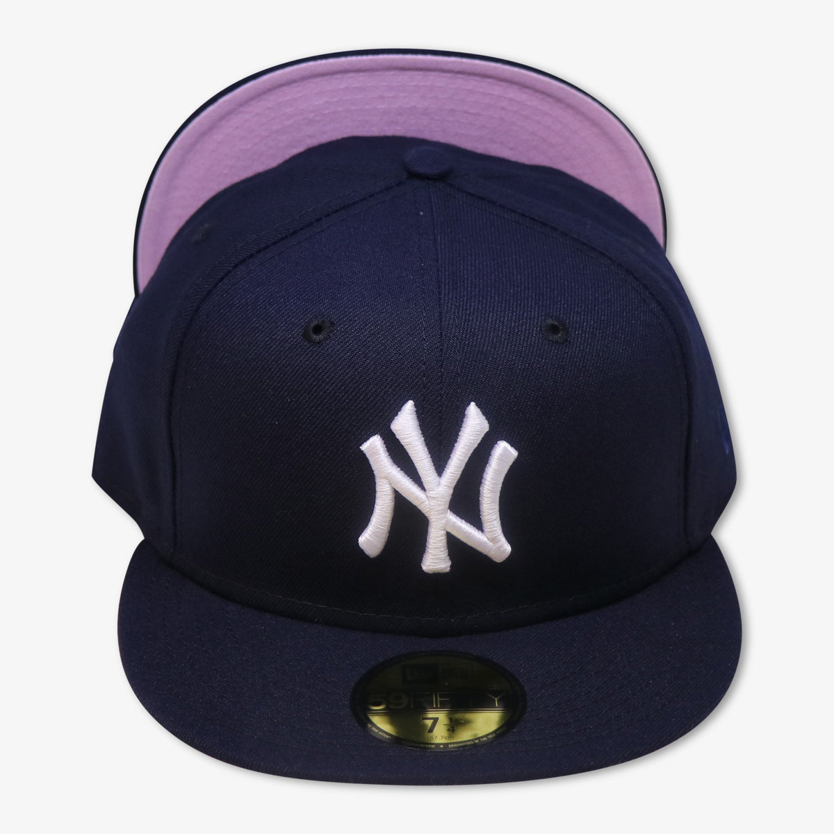 navy blue and pink fitted hat